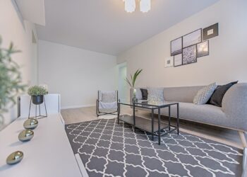 Three Gray Ornaments on White Wooden Desk Inside Living Room