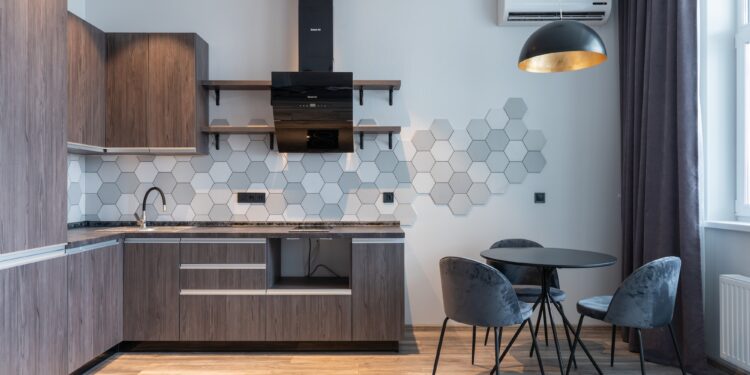 Modern kitchen interior with furniture and lamp at home